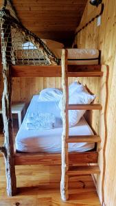 Postel nebo postele na pokoji v ubytování Cabanes et Lodges du Belvedere