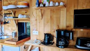 Kuchyň nebo kuchyňský kout v ubytování Cabanes et Lodges du Belvedere