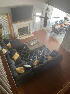 an aerial view of a living room with a couch at House on the Hill in Columbia