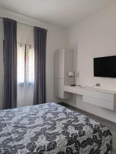 Postel nebo postele na pokoji v ubytování Il Quadrifoglio