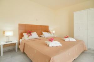 Кровать или кровати в номере Mare Hotel Apartments