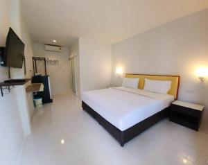 Postel nebo postele na pokoji v ubytování PS 2 Resort Phuket Patong - SHA Plus