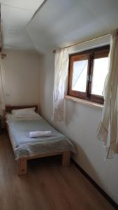 Letto o letti in una camera di Gremeli Wine & Hotel