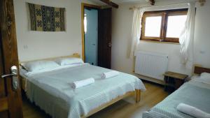 Letto o letti in una camera di Gremeli Wine & Hotel