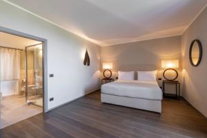 Palazzo Massaini - Le Scuderie客房内的一张或多张床位