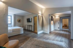 Palazzo Massaini - Le Scuderie客房内的一张或多张床位