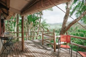 Balkón nebo terasa v ubytování La Vieille Cheminée, Tropical Farm & Eco-Lodges