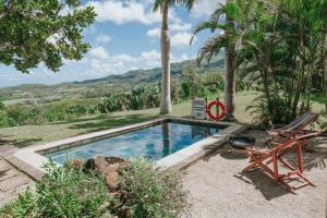 Bazén v ubytování La Vieille Cheminée, Tropical Farm & Eco-Lodges nebo v jeho okolí