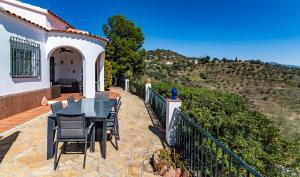 A balcony or terrace at House of the Rising Sun