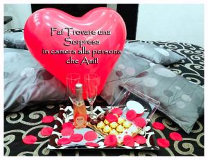 A bed or beds in a room at San Pietro Shabby Chic Apartment