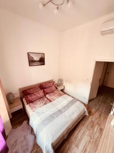 Postel nebo postele na pokoji v ubytování Arbes 12 + 15 fotografií