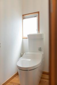 Vannituba majutusasutuses 篠山城下町ゲストハウス inosica