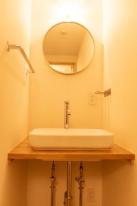 Vannituba majutusasutuses 篠山城下町ゲストハウス inosica
