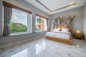 En eller flere senge i et værelse på Q LA Villas + 109 billeder