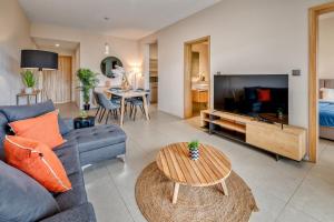 TV a/nebo společenská místnost v ubytování Minissy luxury Serviced Apartment