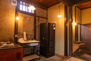 Koupelna v ubytování 篠山城下町ゲストハウス quolo + 37 fotografií