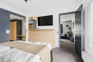 Best Western Plus Hotel Odense客房内的一张或多张床位