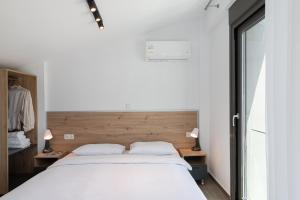 Postel nebo postele na pokoji v ubytování Sea Residence Complex