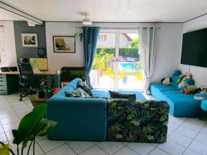 Et opholdsområde på Maison avec piscine 14 personnes