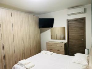Postel nebo postele na pokoji v ubytování Residenza Cinisello Balsamo Milano