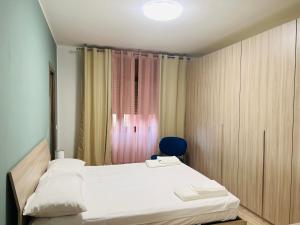 Postel nebo postele na pokoji v ubytování Residenza Cinisello Balsamo Milano