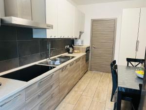 Kuchyň nebo kuchyňský kout v ubytování Residenza Cinisello Balsamo Milano