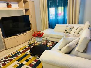 TV a/nebo společenská místnost v ubytování Residenza Cinisello Balsamo Milano