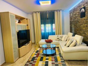 TV a/nebo společenská místnost v ubytování Residenza Cinisello Balsamo Milano