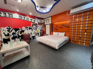 Postel nebo postele na pokoji v ubytování 第八月台九號行館No9 Hotel