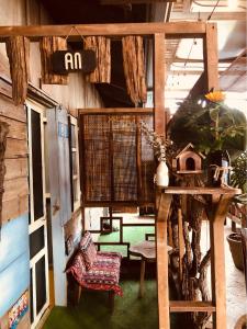 Posezení v ubytování Nhiên Farm Homestay