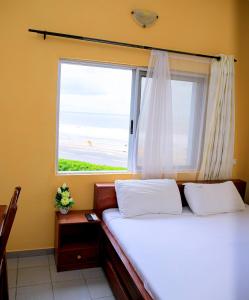 Postel nebo postele na pokoji v ubytování Stella Maris Hotel