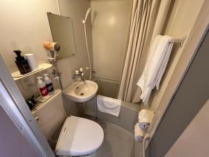 Ein Badezimmer in der Unterkunft Hotel Marsh Land