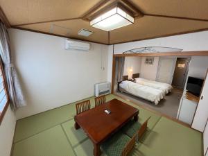 Ein Bett oder Betten in einem Zimmer der Unterkunft Hotel Marsh Land