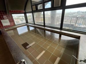 Ein Badezimmer in der Unterkunft Hotel Marsh Land