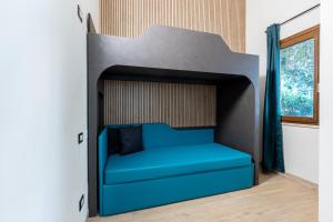 Cama ou camas em um quarto em Villaggio Miramare