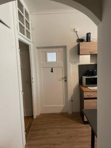 Kuchyň nebo kuchyňský kout v ubytování Black Style ROOMS Moravske namesti