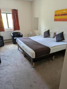 Postel nebo postele na pokoji v ubytování Britannia Hotel Aberdeen