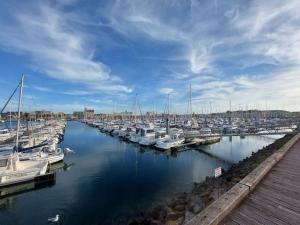 a bunch of boats docked in a harbor at Le Hameau du Phare - La Chaume 100 m plage in La Chaume