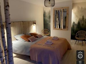 Ένα ή περισσότερα κρεβάτια σε δωμάτιο στο Maison Souche