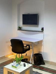 TV a/nebo společenská místnost v ubytování Cozy master room