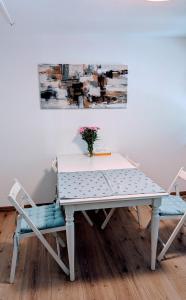 Posezení v ubytování A cozy little flat in Ried + 12 fotografií