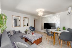 Μια τηλεόραση ή/και κέντρο ψυχαγωγίας στο Apartment Richard