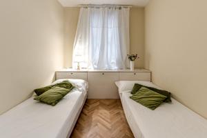 A bed or beds in a room at Flora - Sweet Dreams in Florence