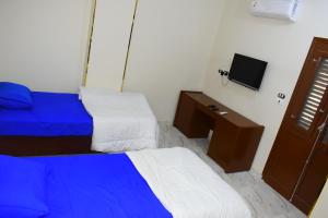 Amoaj hotel فندق امواج客房内的一张或多张床位