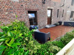 Ein Garten an der Unterkunft Gîte de l'Espinette
