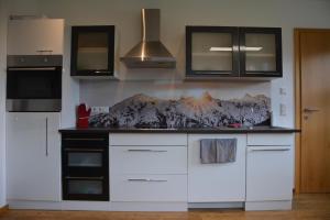 A kitchen or kitchenette at Appartement Wieshof