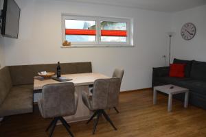 A seating area at Appartement Wieshof