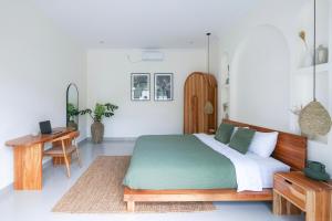 Giường trong phòng chung tại Villa Suksma Canggu +30 ảnh