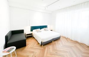 Postel nebo postele na pokoji v ubytování Mamas