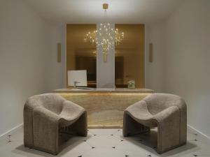 Гостиная зона в Golden Luxury Suites